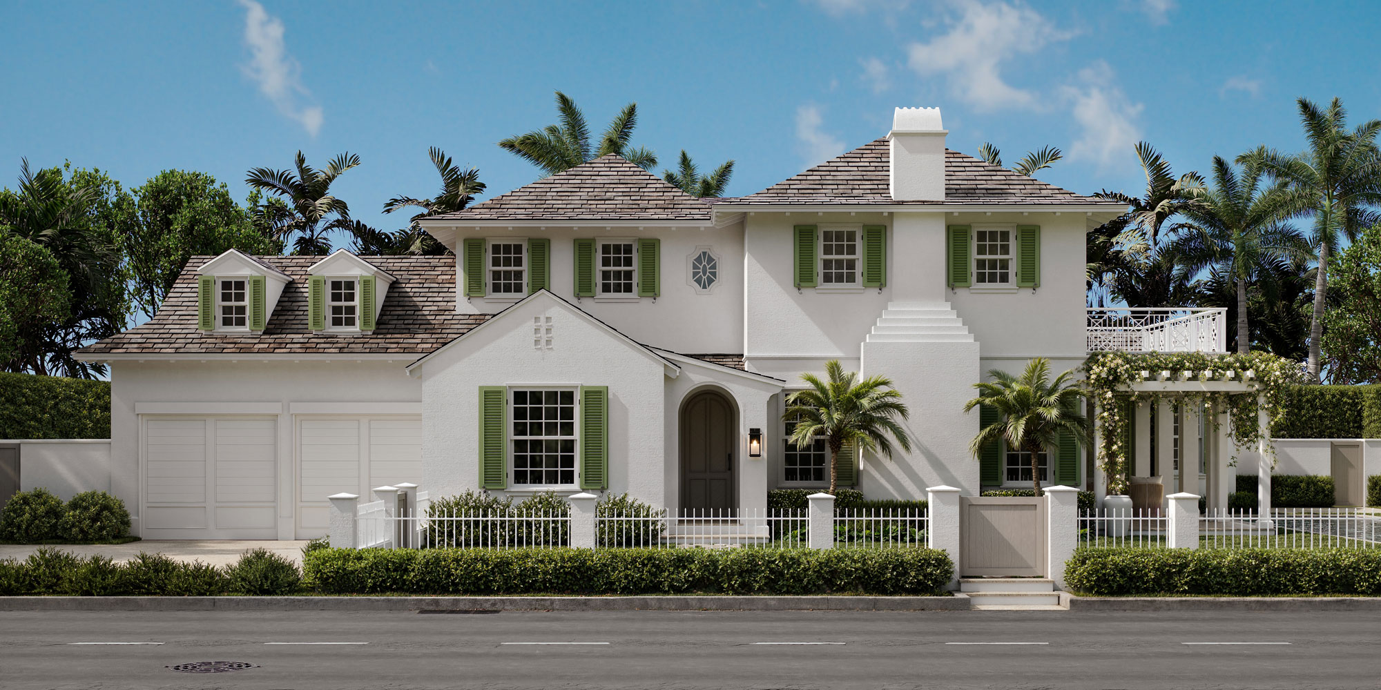 A two-story white house with green shutters, a grey roof, and a front yard enclosed by a white fence.